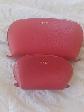 Cuyana cosmetic red leather pouch set